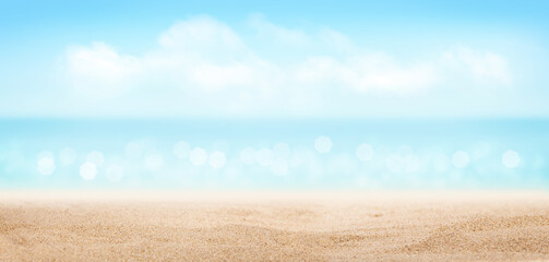 Fototapeta na wymiar Summer tropical sea with sparkling waves, sand and blue sunny sky