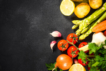 Food cooking background at black table top view.