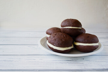 American cakes Whoopie pie close-up on the table. horizontal view from above