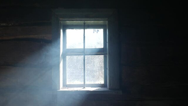 Smoke in a ray. Light falling from a window.