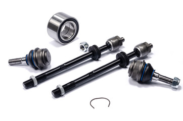 Auto parts on a white background. Running gear repair, ball joints, tie rods and bearing. Auto parts advertisement