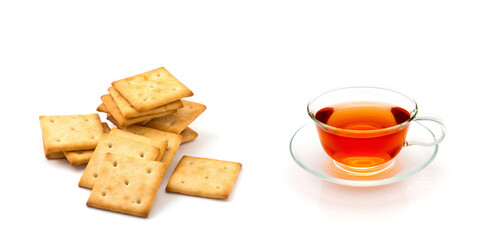 Cup of tea and cookies isolated on white