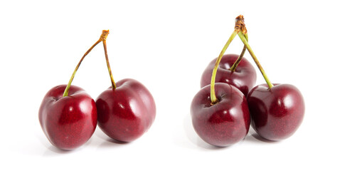 Sweet ripe cherry isolated on white background.