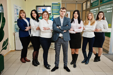 Portrait of young business people group of bank workers in modern office.