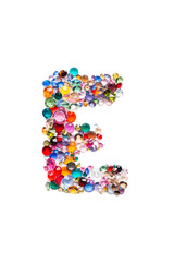 Letter E made from beautiful glass bright gems or crystals on isolated white background