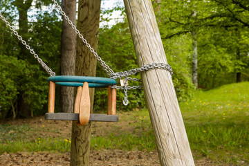 And COVID-19 closed the playground sign and padlock