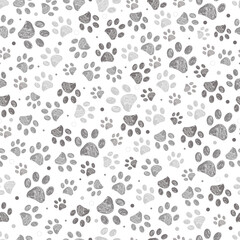 Doodle grey paw print seamless fabric design repeated pattern with grey background © Gulsen Gunel