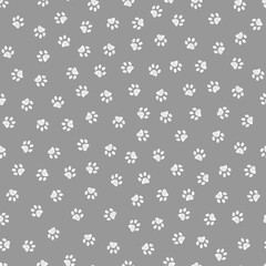 Doodle white paw print seamless fabric design repeated pattern with grey background