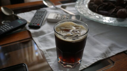glass of cola with ice