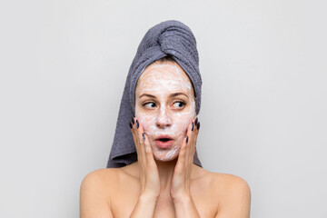 beautiful girl makes a cosmetic face mask, skin care © Aliaksandr
