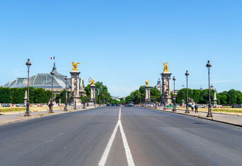 Avenue du Marechal-Gallieni and Esplanade des Invalides with Pont Alexandre III and Grand Palais in the background - Paris, France