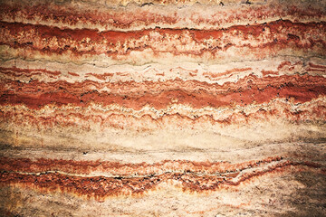 multicolor fragment of wall in potassium salt mine with stripes