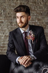 portrait of the groom in the Studio