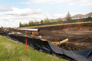 Construction of Oil and Gas pipeline in a city. Welding. Trans mountain pipeline in...