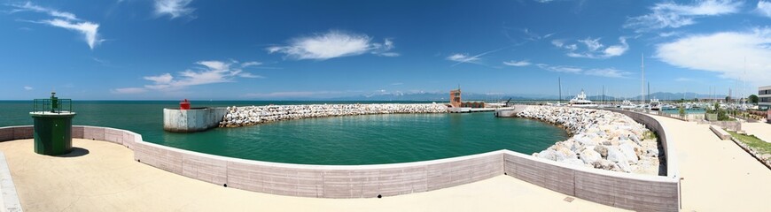 Panoramic summer view of seaport. Marina di Pisa. Tuscany. Italy.