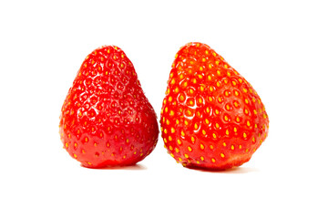 Two strawberries isolated on white background