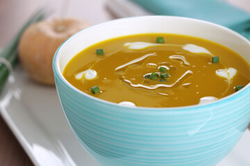 Pumpkin soup with coconut milk and chives