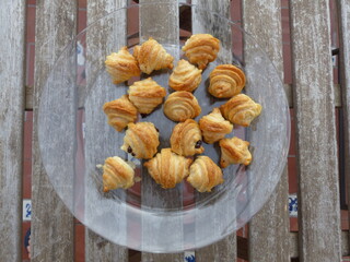 Small croissants filled with chocolate, freshly baked. Baked pastries. French pastry