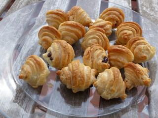 Small croissants filled with chocolate, freshly baked. Baked pastries. French pastry