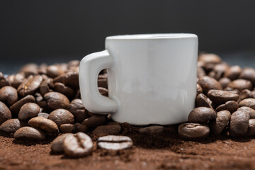 CUP OVER ROASTED COFFEE BEANS