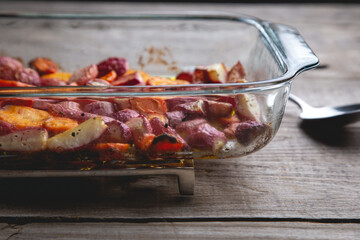 Healthy baked radishes and carrots