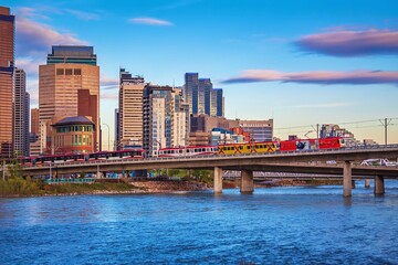 City Trains Crossing Over The Bow River