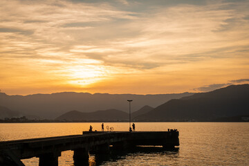 Obraz premium Sunset sky over the pier