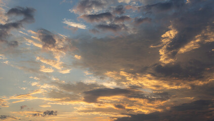 Beautiful sunset sky above clouds with dramatic light