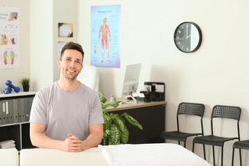 Portrait of massage therapist in medical center