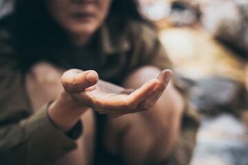 poor people,homeless or beggar begging for help sitting at dirty slum.concept for poverty hunger,human rights,donate and charity for underprivileged children in third world