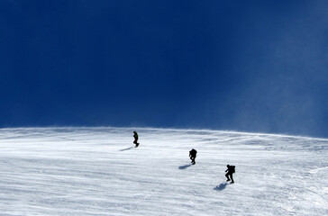 Mountaineer climbing Mont Blanc at Gouter Route in French Alps, France.