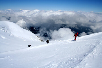 Fototapeta na wymiar Mountaineer climbing Mont Blanc at Gouter Route in French Alps, France.