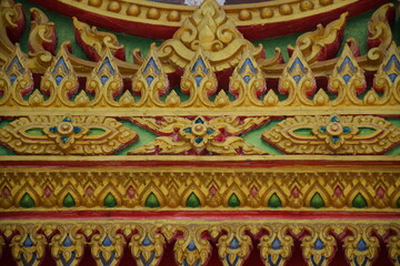Fototapeta na wymiar Stucco patterns on temple arches