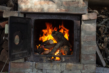 wood burning in a fireplace for barbecue