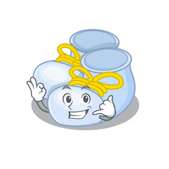 Caricature design of baby boy boots showing call me funny gesture