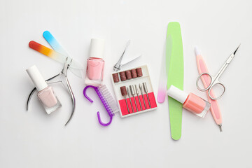 Supplies for manicure on white background