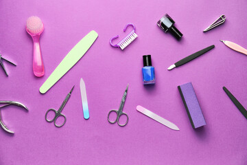 Supplies for manicure on color background
