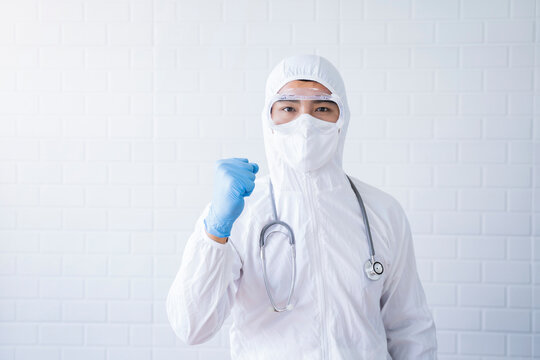 Medical healthcare scientist doctor joyful happy cheering encouragement wearing goggles blue latex gloves white suit stethoscope protective protection bacterial infection virus, hospital laboratory