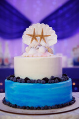 Beautiful tall wedding cake for the bride and groom