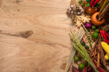 fresh herbs and spices on wooden background