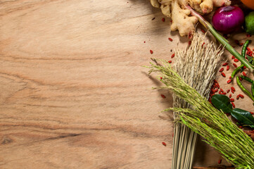 fresh herbs and spices on wooden background