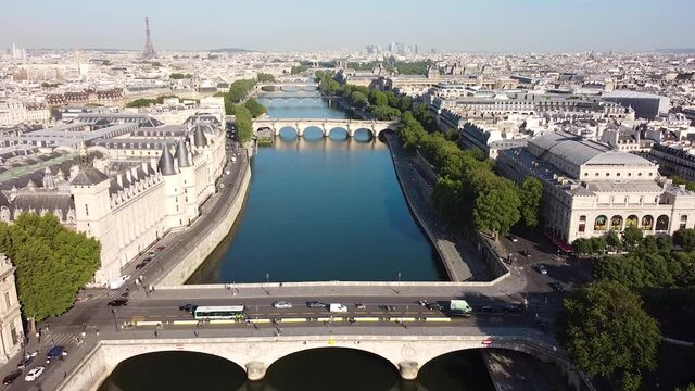 Amazing aerial reverse at Quai de l'horloge and bridge in Paris