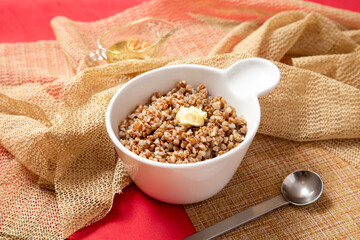 Buckwheat porridge with butter for breakfast at home