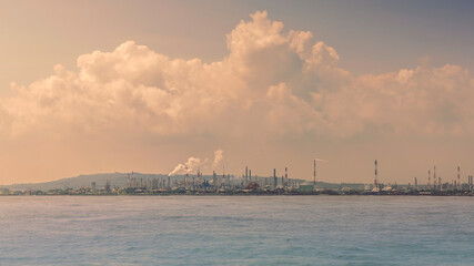 Industrial landscape view from the ocean at power plant form industry zone