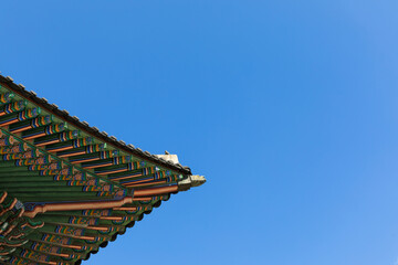 Korean traditional palace roof and blue sky