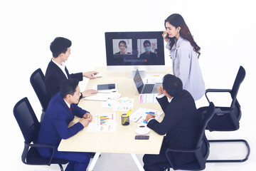 Businesspeople or office worker are working and video meeting online conference and wear mask for protect Covid-19 or corona virus disease but business must be continuous, healthcare concept 