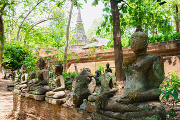 Fototapeta na wymiar Wreckage of Buddha Statues at Wat U Mong Temple, Chiangmai, Thailand