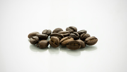 COFFEE BEANS ON A WHITE BACKGROUND