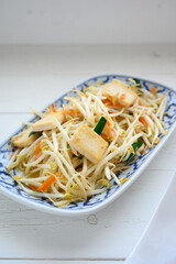 Stir Fried Bean Sprouts with tofu and scallion. Asian vegetable stir fry