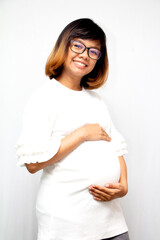 beautiful pregnant woman Standing to hold the stomach on a white background